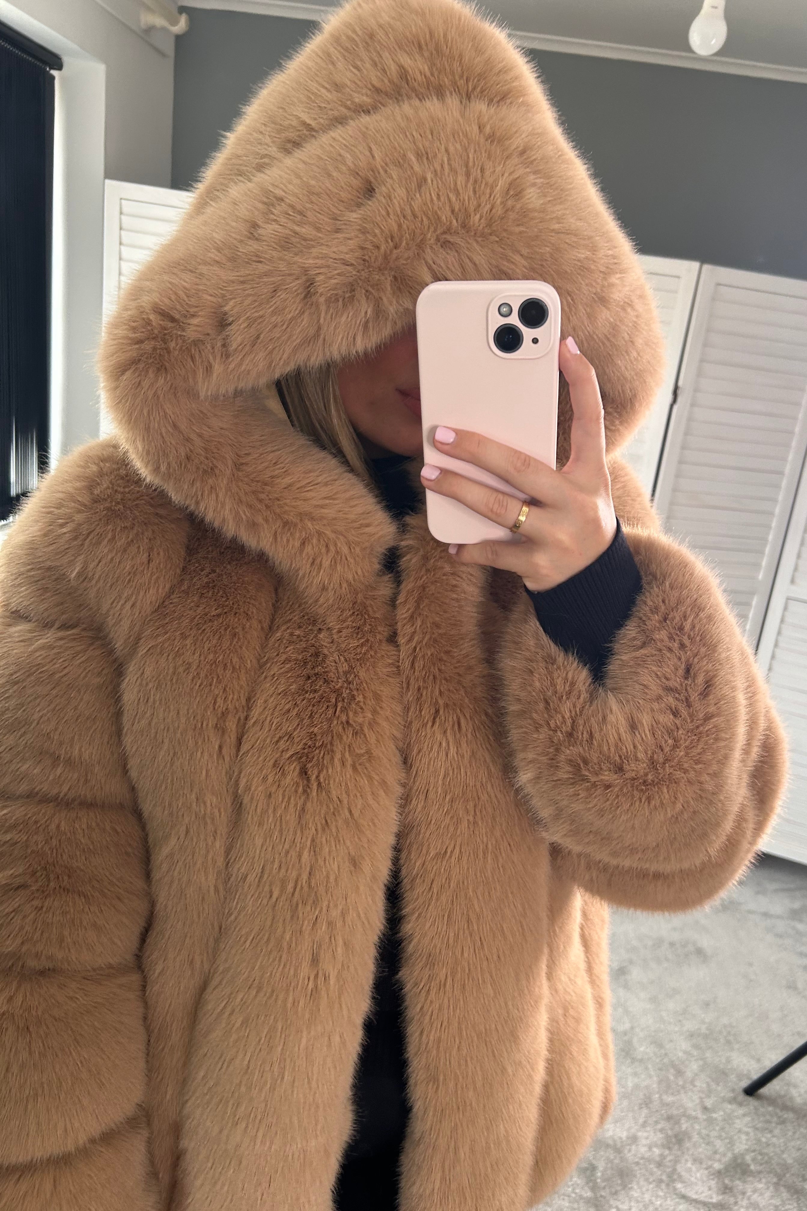 Premium faux fur hooded coat in camel | tan.  This luxury faux fur hood jacket is designed to keep you warm in cold weather. Crafted from a premium faux fur material, it is both soft and durable.