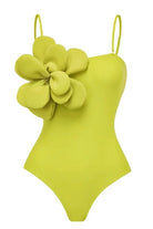 3D Detail Swimsuit in yellow | lime with strap detail. Made with a high quality fabric this swimsuit will make you feel both stylish and comfortable.