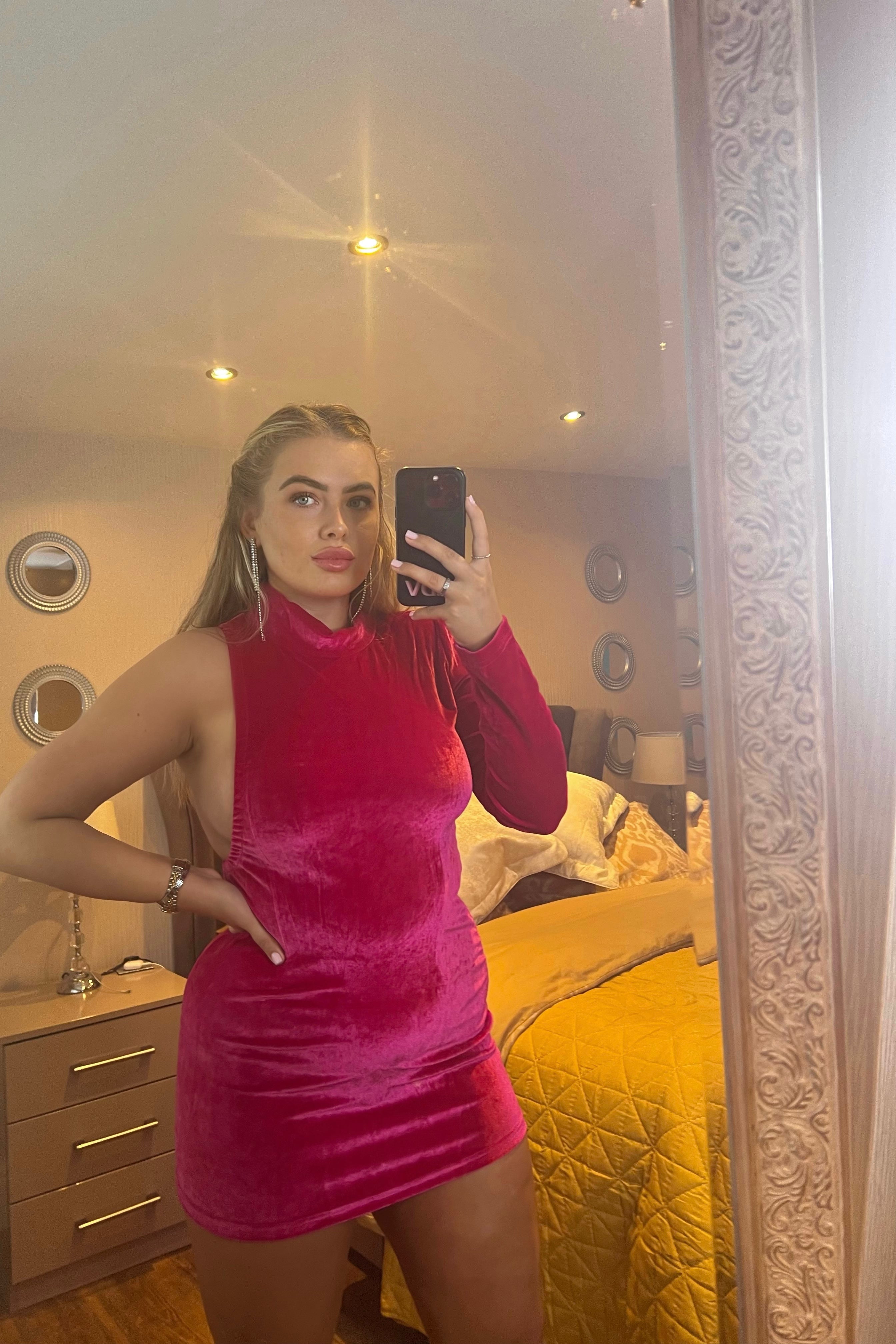 The Fern Velvet One Shoulder Mini Dress in pink is the perfect glam party dress. 