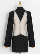 Women's diamante cutout back detail blazer in black.