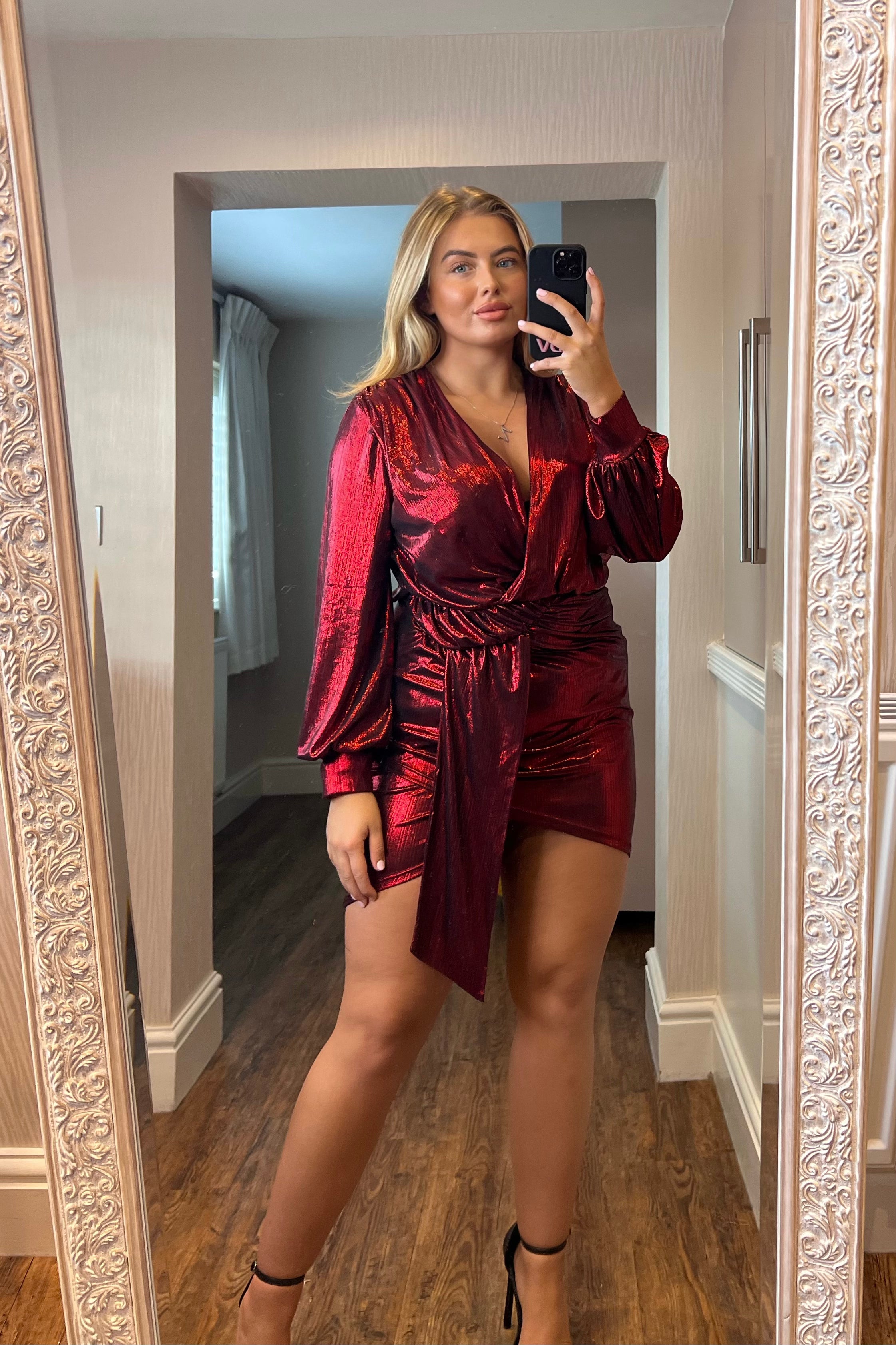 Metallic mini drape dress in red shimmer. Featuring a plunge detail front and ruched drape this is your perfect mini dress. The fabric offers slight stretch making this a super comfortable fit.